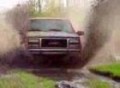 1993 GMC Yukon hitting a watery mud pit at speed!