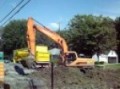 Daewoo 340LCV digging a street