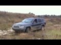 Decending from steep brush covered hill in Jeep Grand Cherokee - WJ.wmv