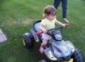 Isabella riding the Kawasaki