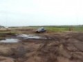 Isuzu Stylus doing reverse muddy donuts