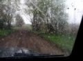 Jeep Driving Through A Muddy Rut