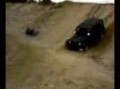 Jeep Unlimited going down steep sand hill