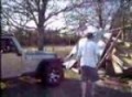 Jeep running over a shed
