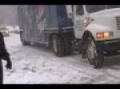 Labatt Blue Beer Tractor Trailer Truck stuck in the snow spinning
