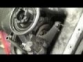 MERCEDES 5 CILINDER TURBO DIESEL ENGINEON A ENGINE STAND. IN SONY HD