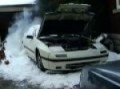 Mazda RX? burnout in snow with parts car?