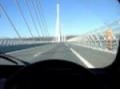 Reflexia the Renault 4 crosses the Millau Viaduct