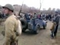 Stalingrad Battle reenactment.German car with 2 MG 42 & soviet infantry man
