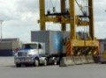 Straddle Carrier Loads Container Onto Truck, Ports of Auckland, 25 Oct 2010