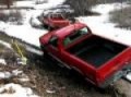 Subaru BRAT pulling out a Chevy