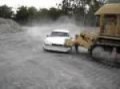 Toyota Camry crashes into bulldozer