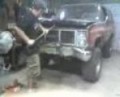 WORKING ON MY TRUCK DINT NO I WAS BEING RECORD IT (TIMMY)