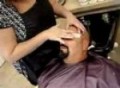 WRESTLER GETTING EYEBROWS WAXED