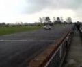 mini cooper on the croft race circuit straight 1