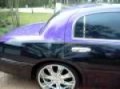purple and black lincoln towncar
